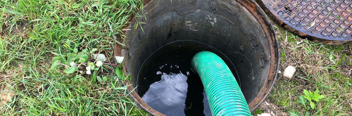 unblocking a blocked manhole using a pipe